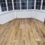 Professional installation of wooden floors.