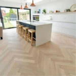 Classic wooden herringbone floor.