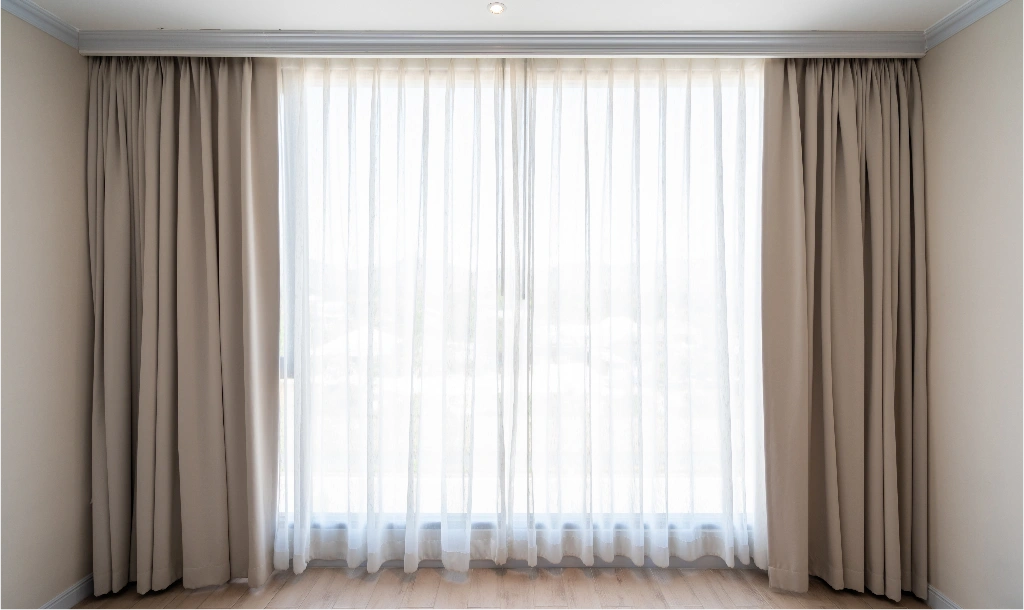 Elegant custom curtains in a bright living room.