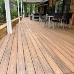 Natural hardwood deck boards.