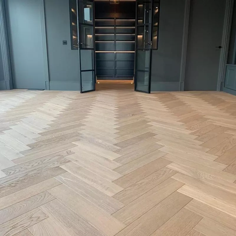 Classic wooden herringbone flooring in elegant Dubai home