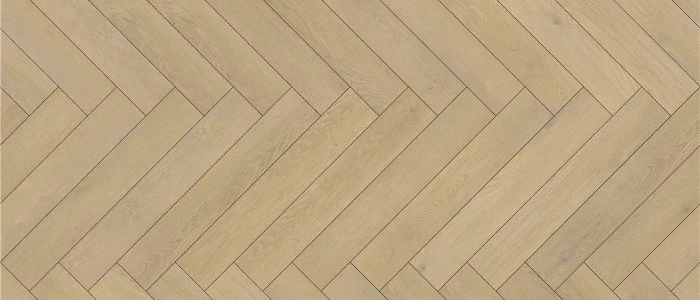 Laminate planks in light wood herringbone design