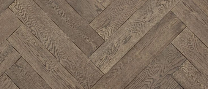 Polished parquet blocks forming herringbone design