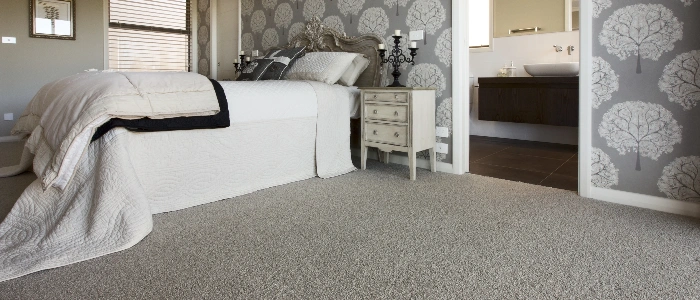 Fluffy shaggy carpet in neutral bedroom decor