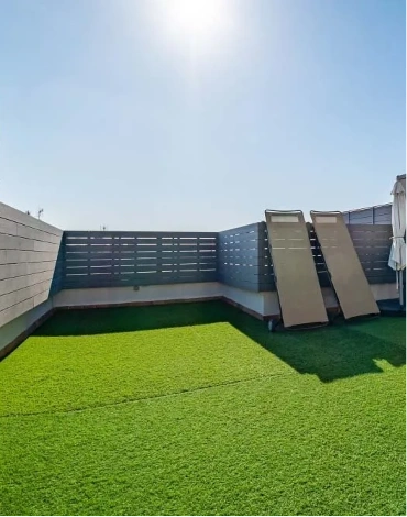 Lush artificial grass on terrace