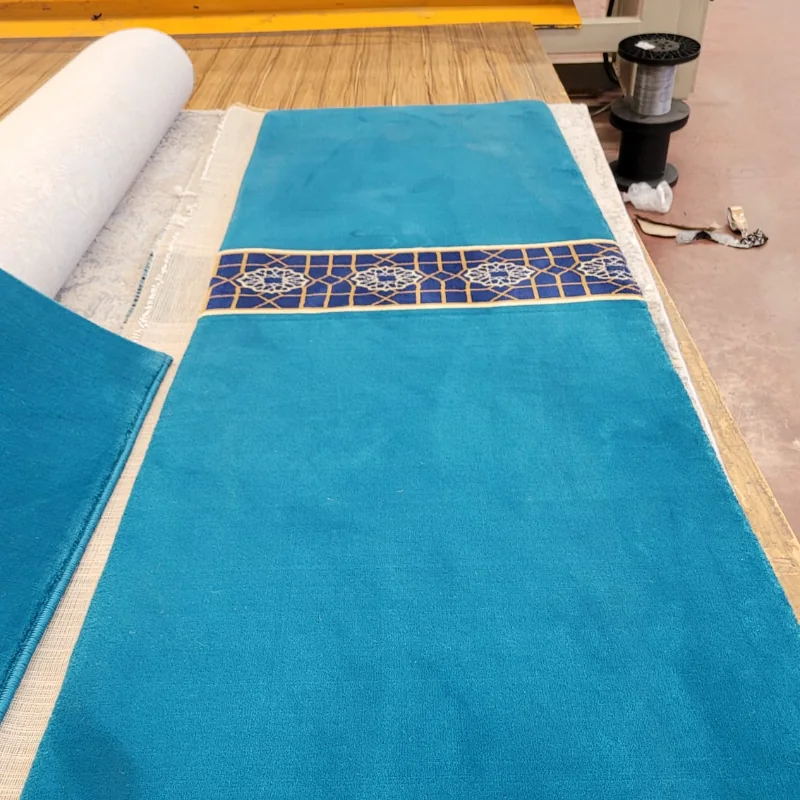 Turquoise Border Carpet Detail